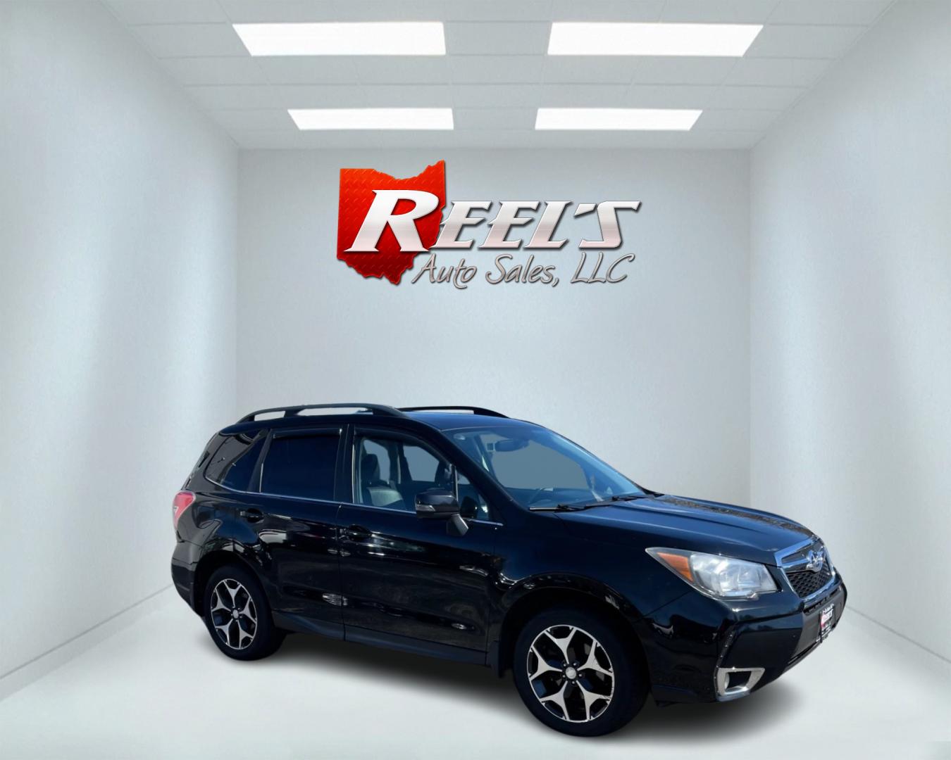 2014 Black /Black Subaru Forester 2.0XT Touring (JF2SJGMC4EH) with an 2.0L H4 SOHC 16V TURBO engine, Automatic transmission, located at 547 E. Main St., Orwell, OH, 44076, (440) 437-5893, 41.535435, -80.847855 - Photo#3